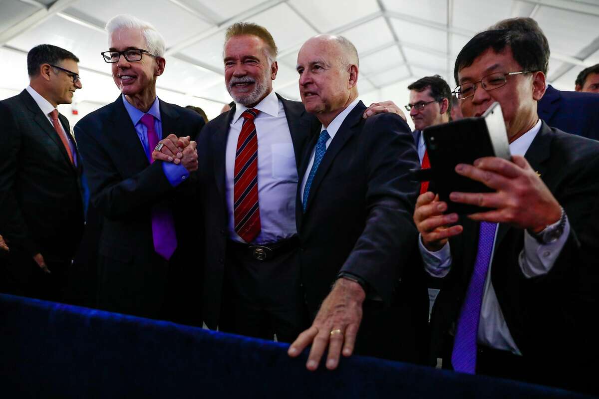 Former California Governor Gray Davis, (second left), Former California Governor Arnold Schwarzenegger (center) pose for a photo with outgoing Governor Jerry Brown (second from right) after Gavin Newsom's inauguration as California Governor in Sacramento, California, on Monday, January 7th, 2019.