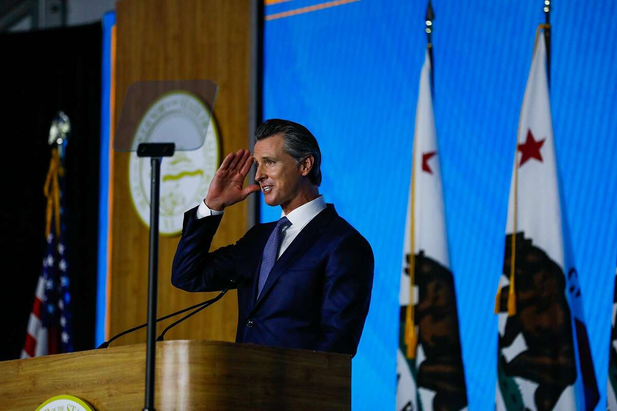 Governor Gavin Newsom salutes to the crowd after taking the oath of office during his inauguration ceremony in Sacramento, California, on Monday, January 7th, 2019.