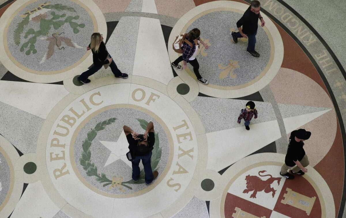 Guests pass through the rotunda at the Texas State Capitol in Austin on Jan. 7, 2019.