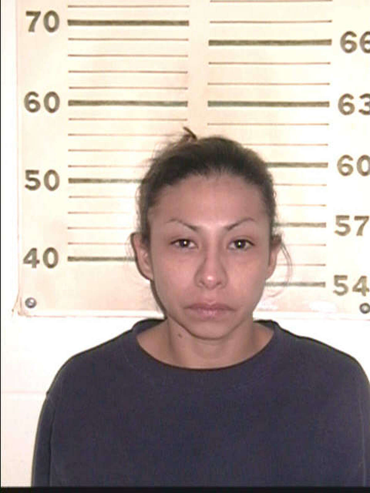 Angie Torres, 45, is facing a robbery charge unrelated to the King Jay Davila investigation. This mugshot was taken in 2004.