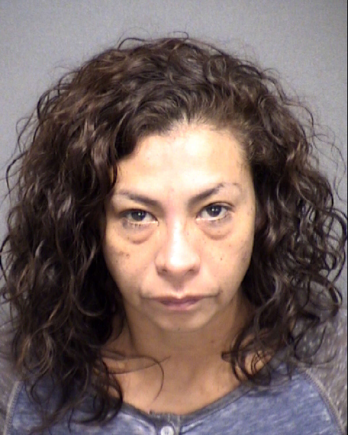 Angie Torres, 45, is facing a robbery charge unrelated to the King Jay Davila investigation.
