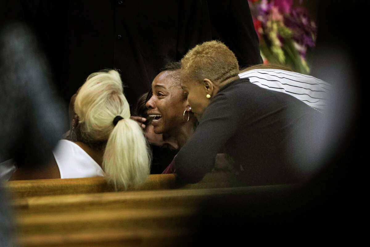 LaPorsha Washington, mother of Jazmine Barnes attends the funeral of her seven-year-old daughter on Tuesday ay The Community of Faith Church, Jan. 8, 2019, in Houston.