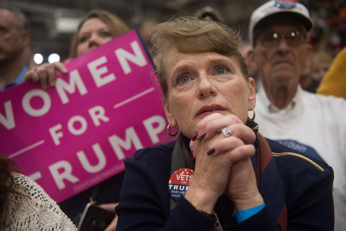 JOHNSTOWN, PA - OCTOBER 21: A supporter of Republican presidential candidate Donald Trump listens on as he speaks during a campaign stop at the Cambria County War Memorial Arena on October 21, 2016 in Johnstown, Pennsylvania. Trump and Democratic presidential nominee Hillary Clinton continue to campaign as Election Day nears. (Photo by Justin Merriman/Getty Images)