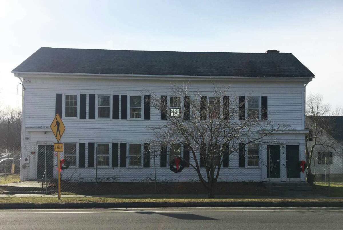 Fate of historic Bridgewater grange, now fenced in, still undecided