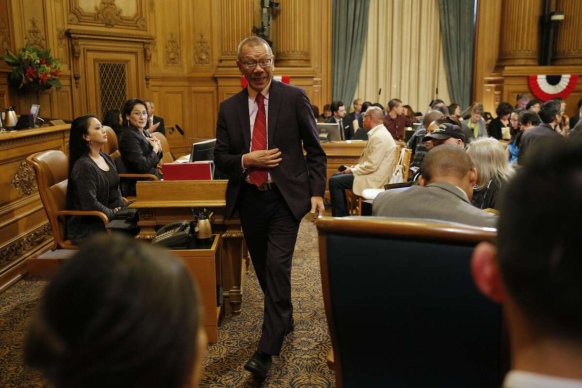 District 7 supervisor Norman Yee exits momentarily during public comment before a vote for the new president of the Board of Supervisors at City Hall on Tuesday, Jan. 8, 2019, in San Francisco, Calif. Yee and District 9 supervisor Hillary Ronen were nominated for the position.