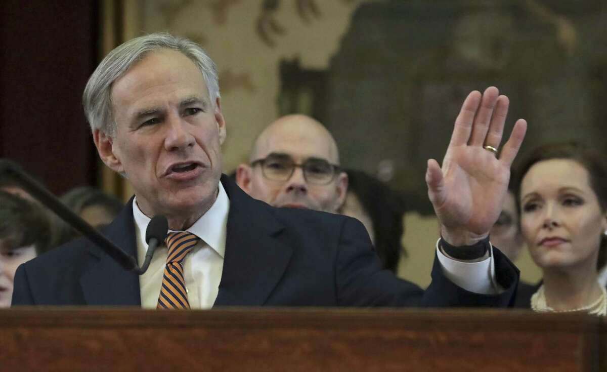 Texas Gov. Greg Abbott addresses the Texas House of Representatives after Speaker of the House Dennis Bonnen, center, was sworn in during the opening session, on Tuesday, Jan. 8, 2019, in Austin, TX.