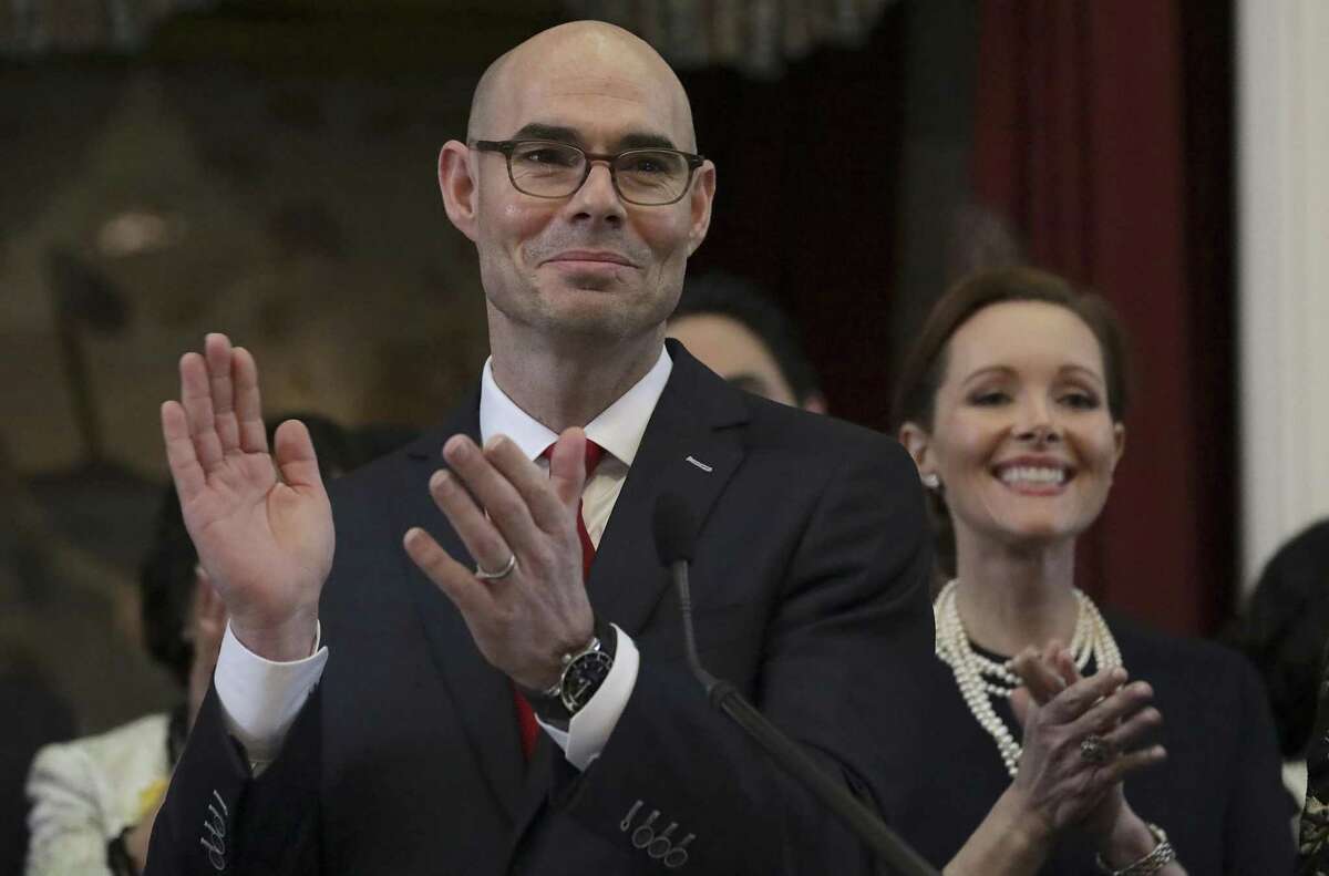 Texas House Speaker Dennis Bonnen, left, and his wife Kimberly are shown during the opening day of the Texas legislative session on Jan. 8, 2019, in Austin.