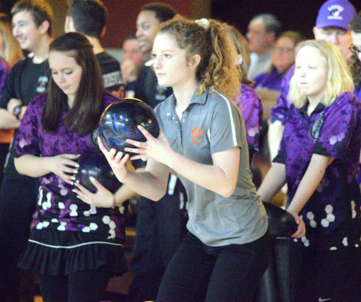 Edwardsville freshman Ashley Kuethe prepares to bowl for a spare during Tuesday’s Southwestern Conference dual match against Collinsville at Edison’s Entertainment Center.