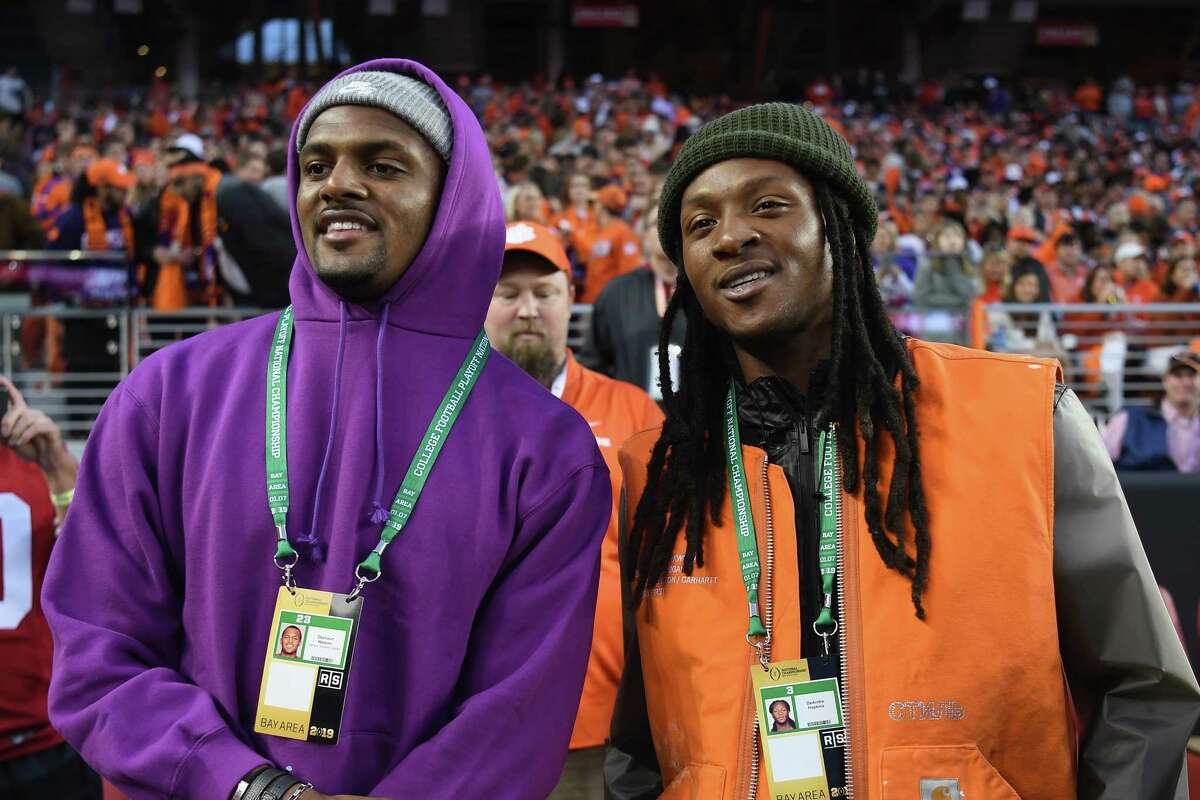 SANTA CLARA, CA - JANUARY 07: Deshaun Watson and DeAndre Hopkins of the Houston Texans look on prior to the CFP National Championship between the Alabama Crimson Tide and the Clemson Tigers presented by AT&T at Levi's Stadium on January 7, 2019 in Santa Clara, California.
