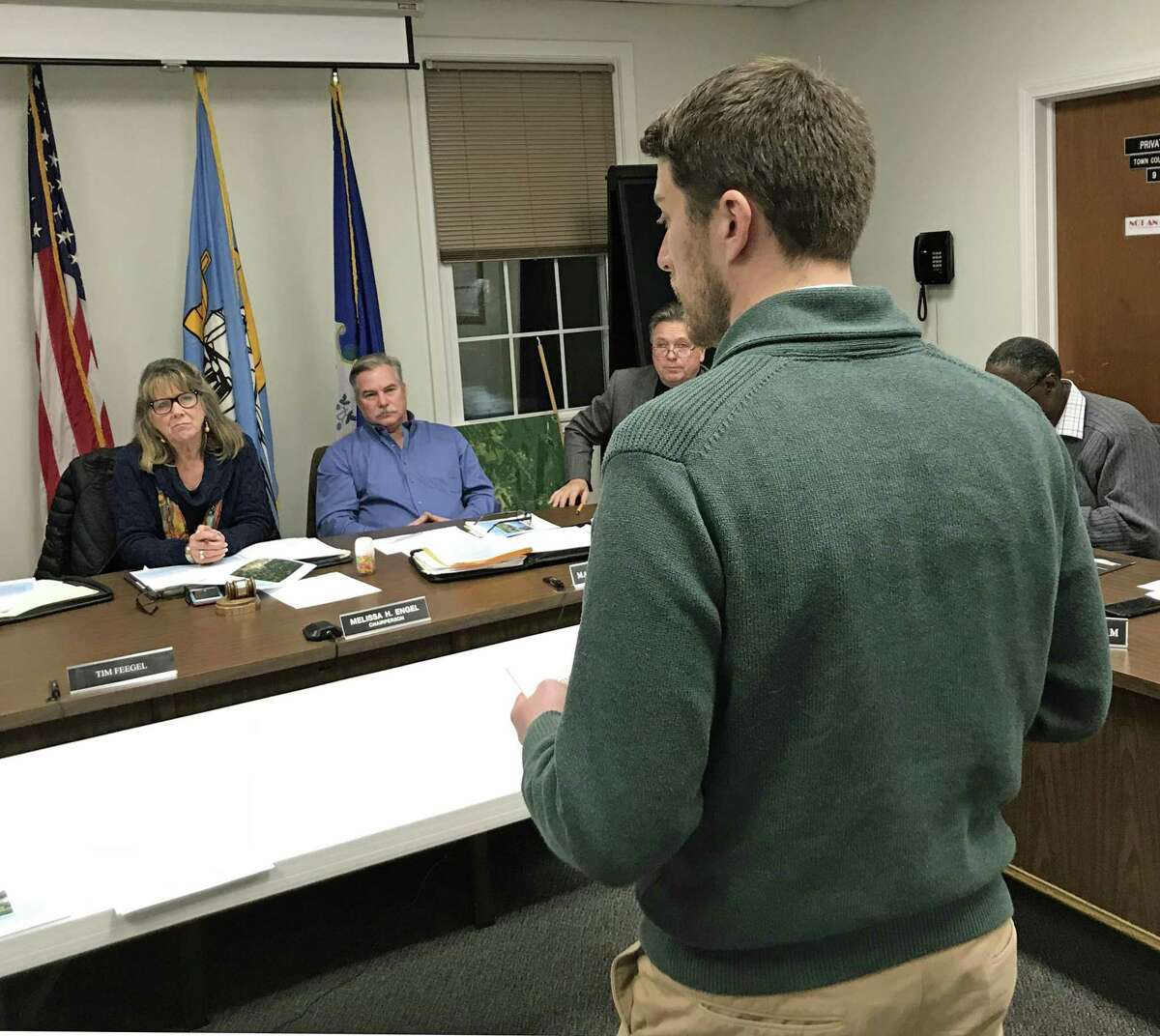 Jeremy DeCarli, East Hampton Planning and Zoning official, addresses Town Council members Tuesday night.