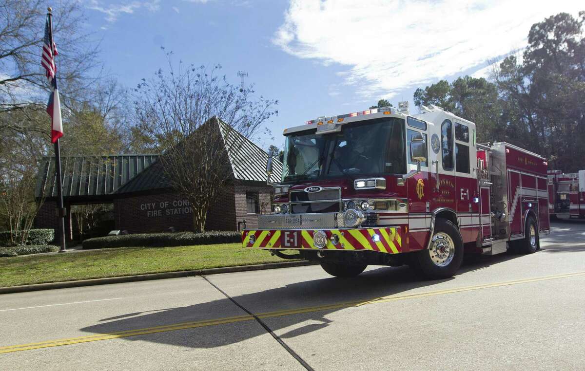 A firetruck with Station 1 leaves on a call, Thursday, Jan. 9, 2018, in Conroe. The Conroe Fire Department has begun phasing in an additional fourth firefighter per truck as part of the department's effort to increase personnel that began January 1.