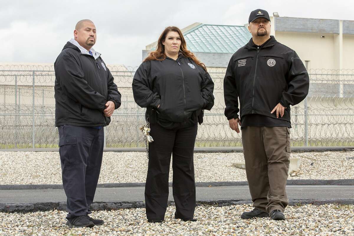 From left: Jose Lau, correctional systems officer and vice president of Local 3584; Samantha Strack, special investigative services technician; and Ed Canales, president of Local 3584 at the Federal Correctional Institution Dublin on Wednesday, Jan. 9, 2019, in Dublin, Calif.