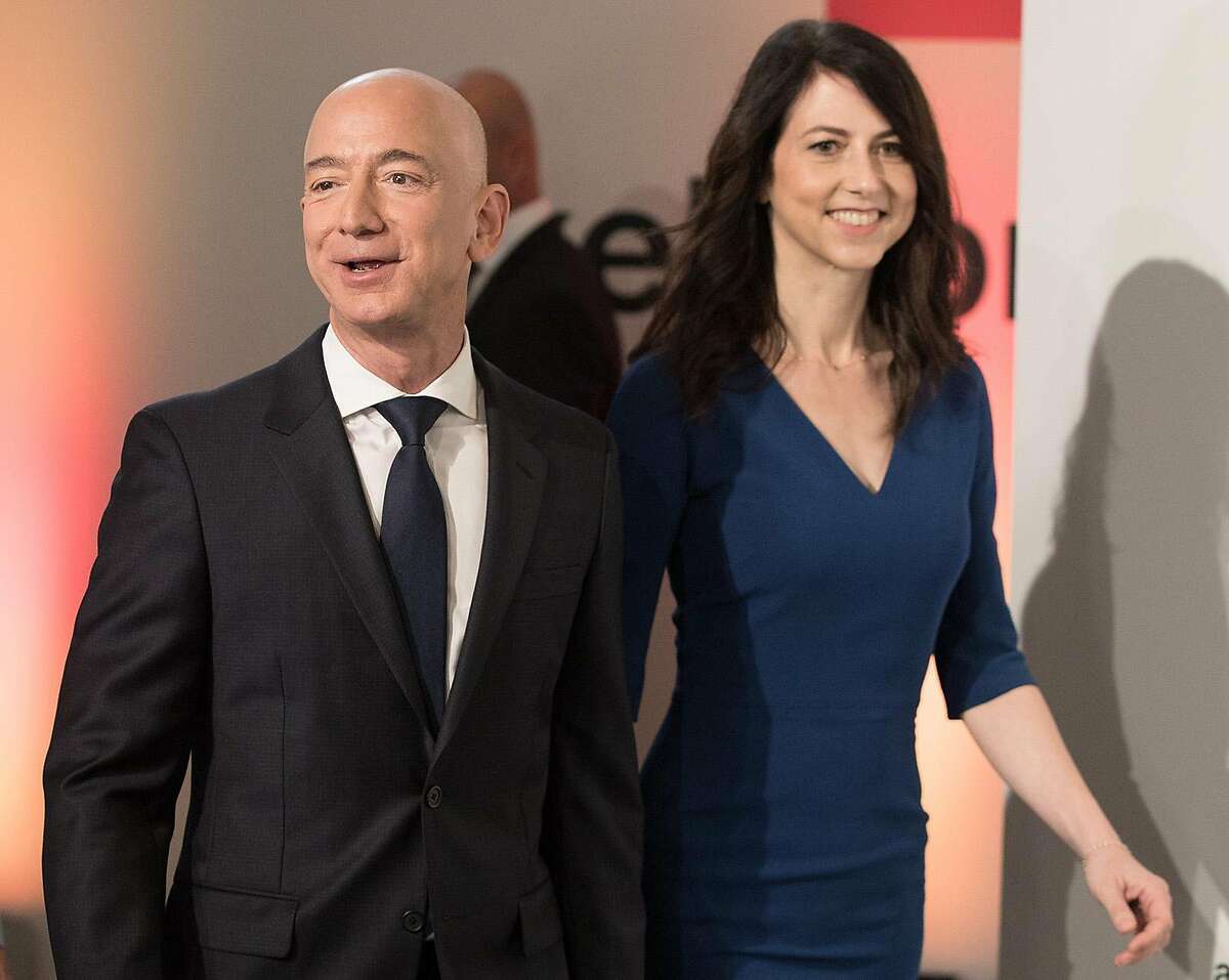 Amazon CEO Jeff Bezos and his wife MacKenzie Bezos arrive for the Axel Springer award ceremony on April 24, 2018. On Jan. 9, 2019, it was announced that Bezos and his wife will divorce after 25 years. (Jorge Carstensen/DPA/Zuma Press/TNS)