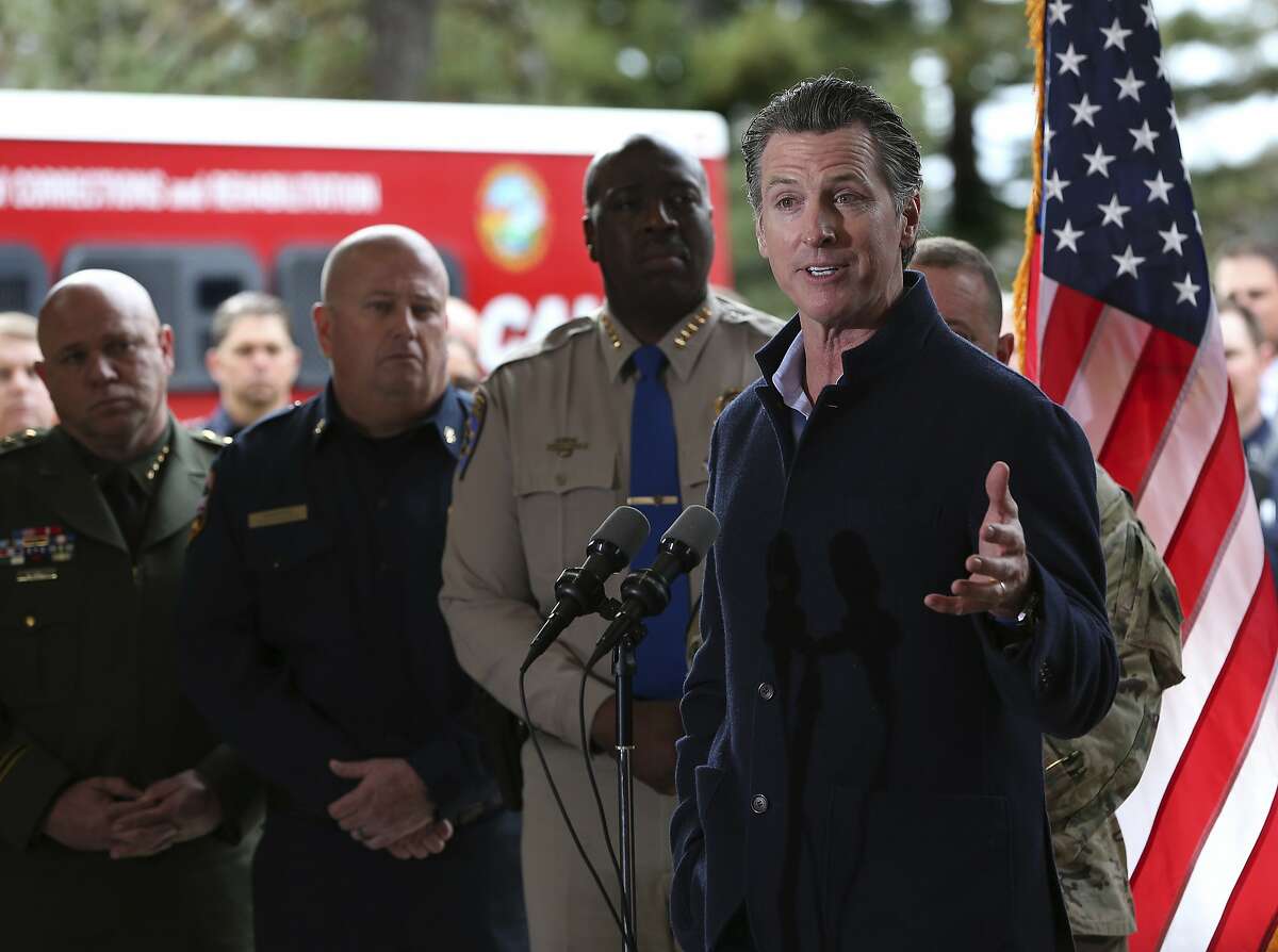 Gov. Gavin Newsom discusses emergency preparedness during a visit to the California Department of Forestry and Fire Protection CalFire Colfax Station Tuesday, Jan. 8, 2019, in Colfax, Calif. On his first full day as governor, Newsom announced executive actions to improve the state's response to wildfires and other emergencies. (AP Photo/Rich Pedroncelli)