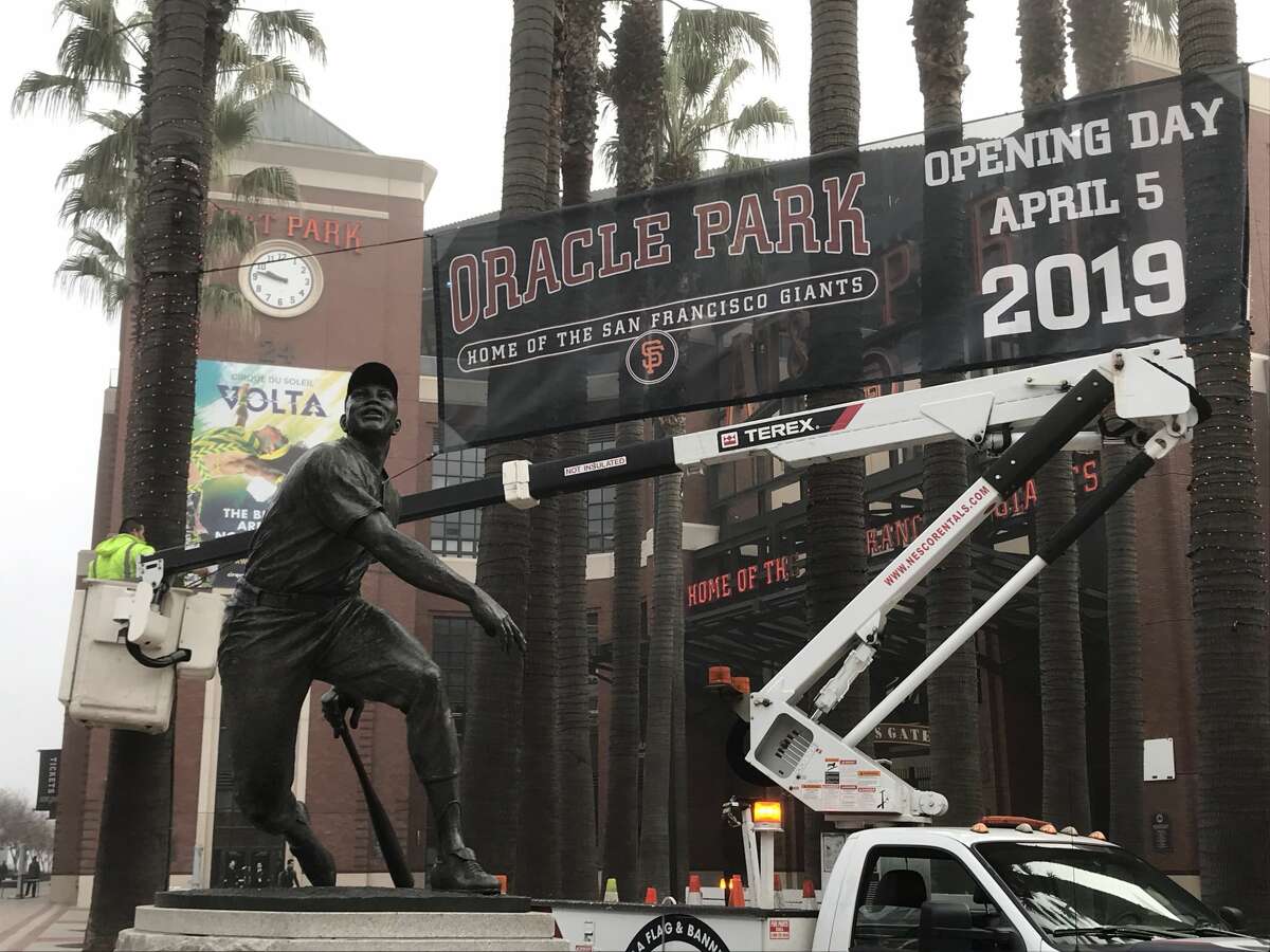 A new banner is installed with the new name of the Giants ballpark, Oracle Park, in San Francisco, Calif. on Thursday, Jan. 11, 2018.