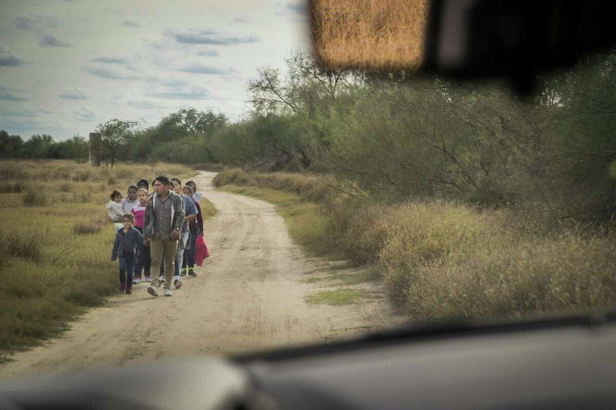 Central American families turn themselves in to Border Patrol agents near McAllen last month. In the fifth week of a partial government shutdown over President Donald Trump's proposed border wall, Trump offered a deal to Democrats to include some humanitarian assistance and 3-year protections for immigrants with DACA and TPS in exchange for $5.7 billion for his wall.