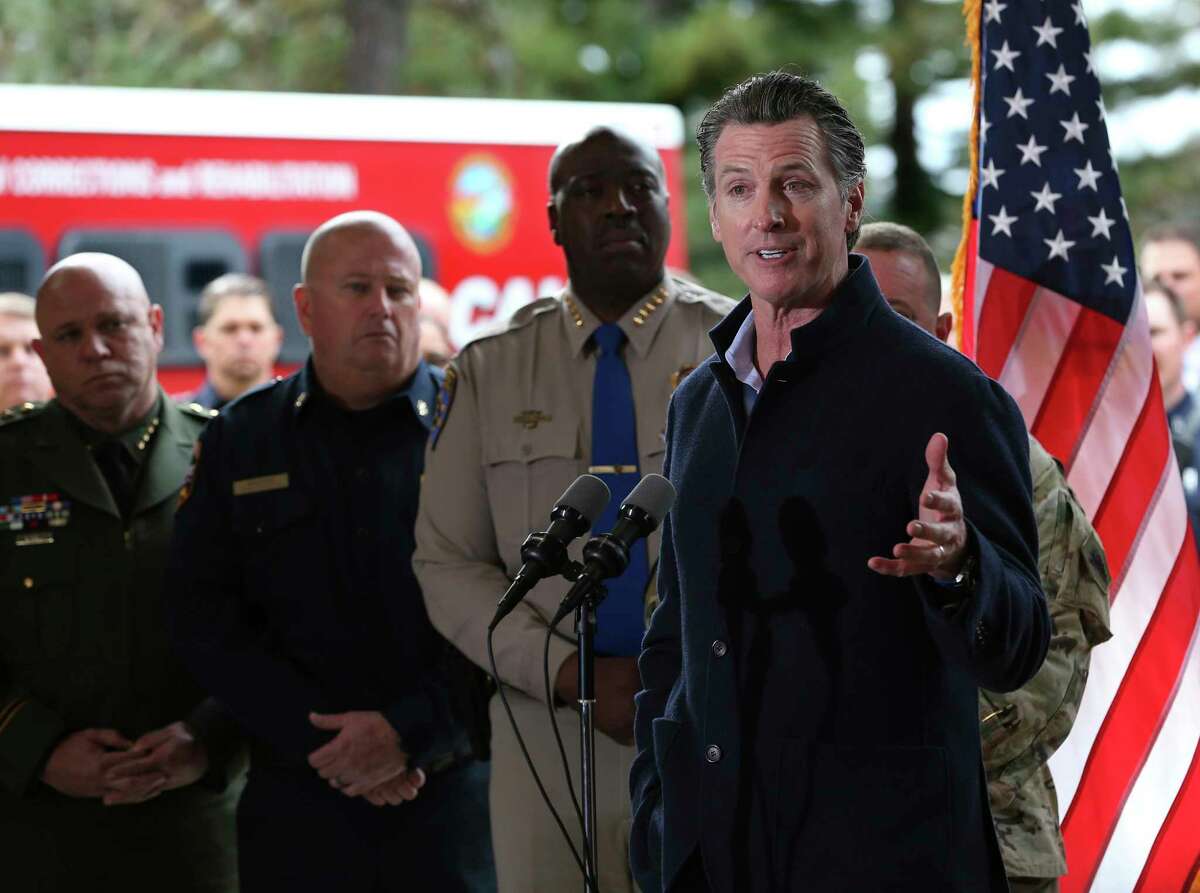 Gov. Gavin Newsom discusses emergency preparedness during a visit to the California Department of Forestry and Fire Protection CalFire Colfax Station Tuesday, Jan. 8, 2019, in Colfax, Calif. On his first full day as governor, Newsom announced executive actions to improve the state's response to wildfires and other emergencies. (AP Photo/Rich Pedroncelli)
