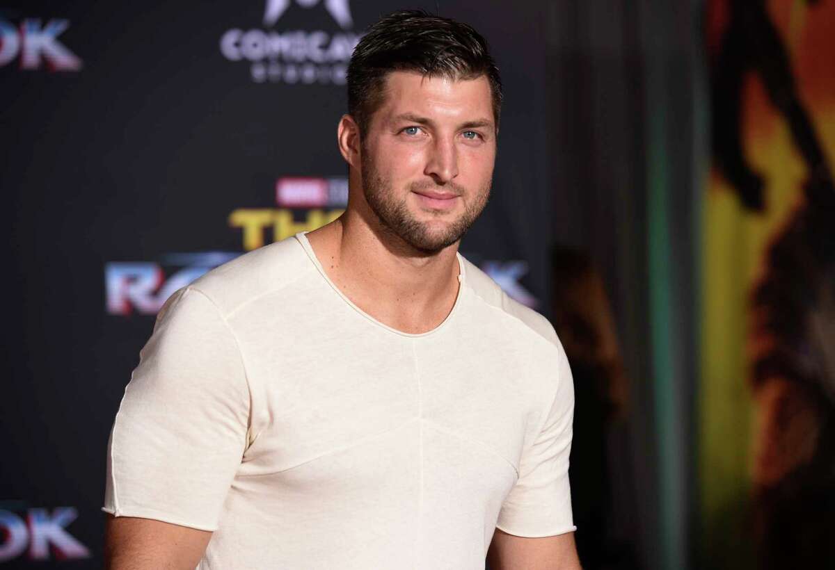 FILE - In this Tuesday, Oct. 10, 2017 file photo, Tim Tebow arrives at the world premiere of "Thor: Ragnarok" at the El Capitan Theatre in Los Angeles. Former Denver Broncos and University of Florida quarterback Tim Tebow is engaged. The Heisman Trophy winner announced his engagement on Instagram Thursday, Jan. 10, 2019 to Demi-Leigh Nel-Peters, a South Africa native and the 2017 Miss Universe. (Photo by Chris Pizzello/Invision/AP, File)