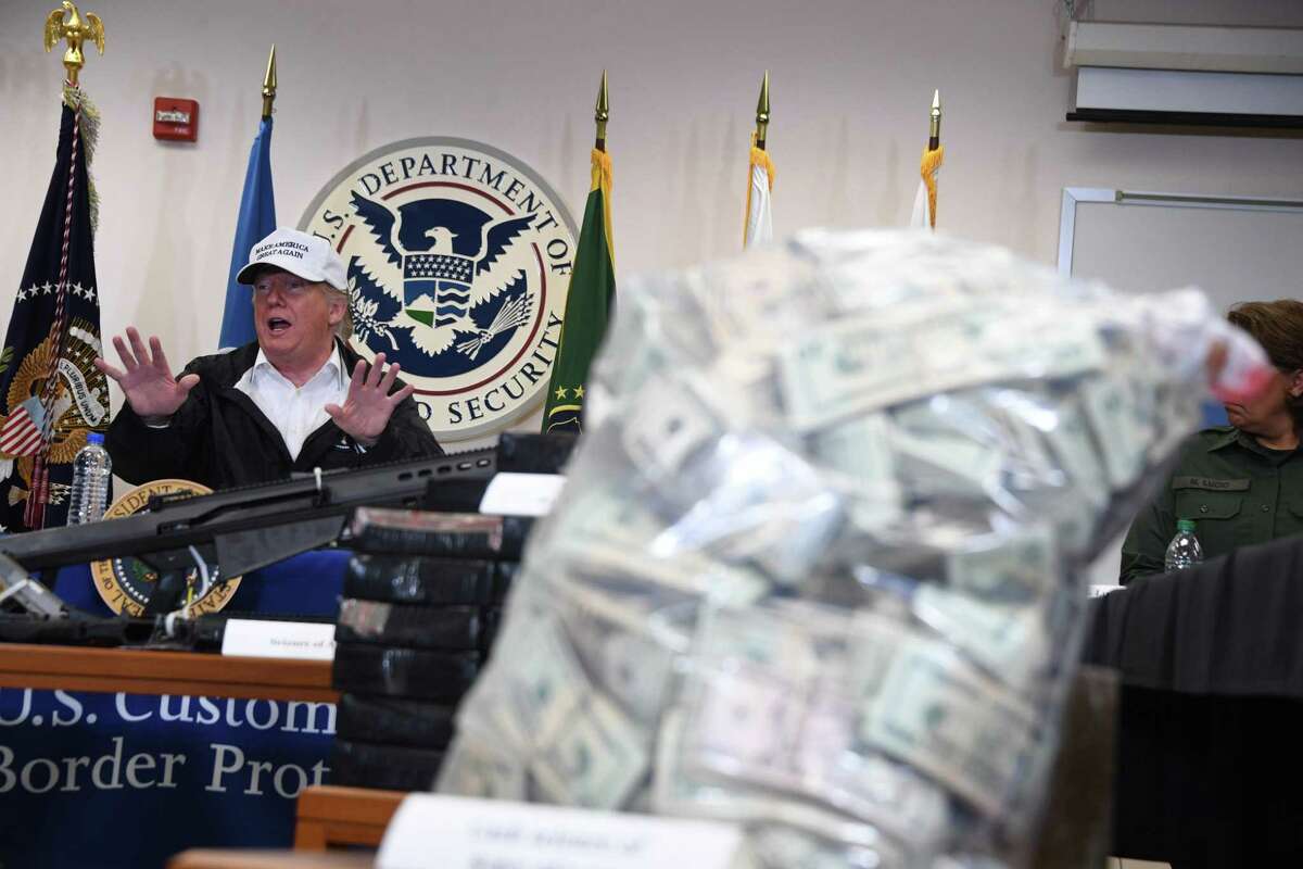President Donald Trump speaks during his visit to the Border Patrol McAllen Station on Thursday. Building a wall will help stem the flow of undocumented immigrants and contraband over the border.