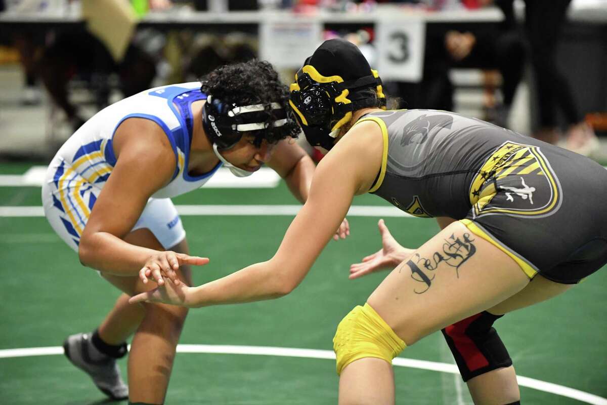 Cy Creek’s Amanda McAleavey and Klein’s Xochitl MotaPettis win state wrestling titles