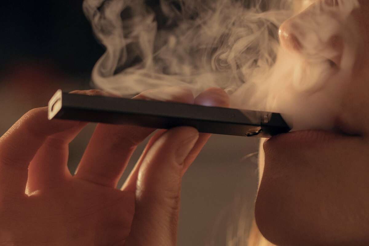 FILE -- A Juul vape device in New York, April 4, 2018. After making billions of dollars and joining forces with Big Tobacco, Juul is trying to reinvent itself as a public-health crusader. (Caroline Tompkins/The New York Times)