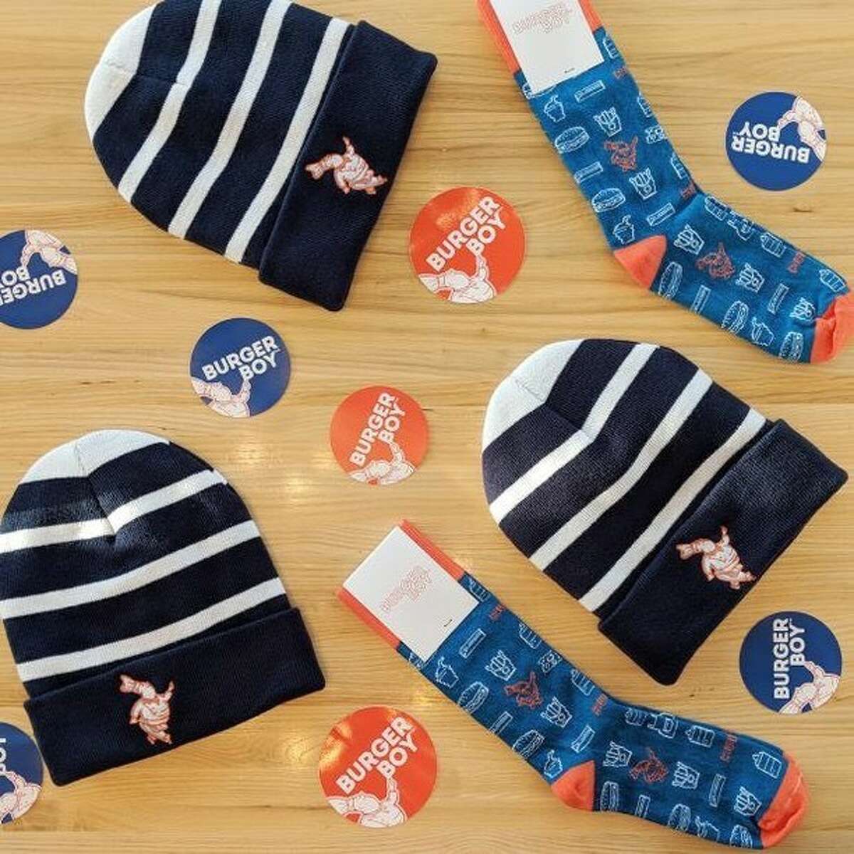 Stay warm and cozy with beanies and socks sold exclusively at Burger Boy locations.
