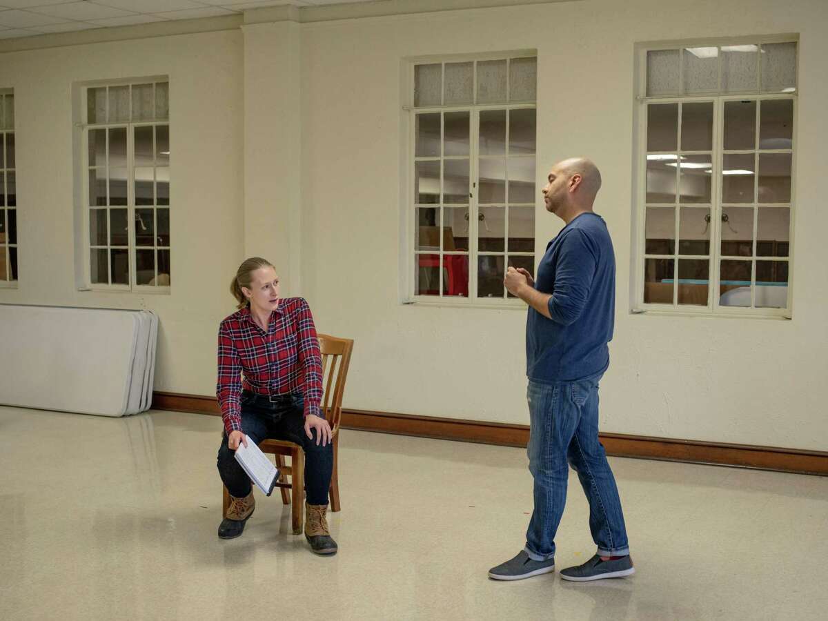 Liz Bouk (left) a mezzo-soprano performing as Hannah after, rehearses alongside Jose Rubio, a baritone performing as Hannah before, right, during a rehearsal for Alamo City Opera’s production of “As One.” The chamber opera follows a transgender woman’s journey to find her true self.