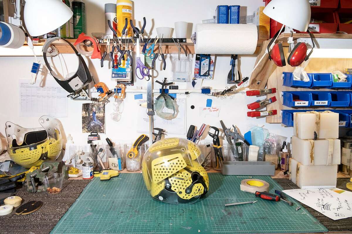 A prototype football helmet sits on a work bench at Brainguard Technologies Inc. facilities in Richmond, California, on Thursday, December 13, 2018. A group of UC Berkeley faculty and alums has launched the start-up Brainguard Technologies Inc. addressing the key issue in CTE: rotational force, and are developing helmets for all major sports that tackle the issue.