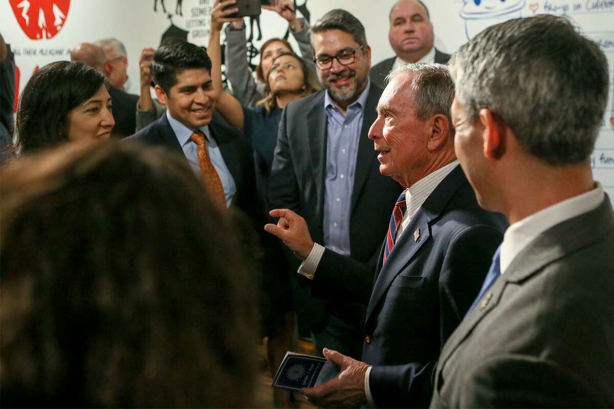 United Nations Special Envoy for Climate Action and former New York City Mayor Michael Bloomberg, second from right, meets members of the San Antonio City Council after a news conference Jan. 11 announcing up to $2.5 million to support a local climate adaptation plan.