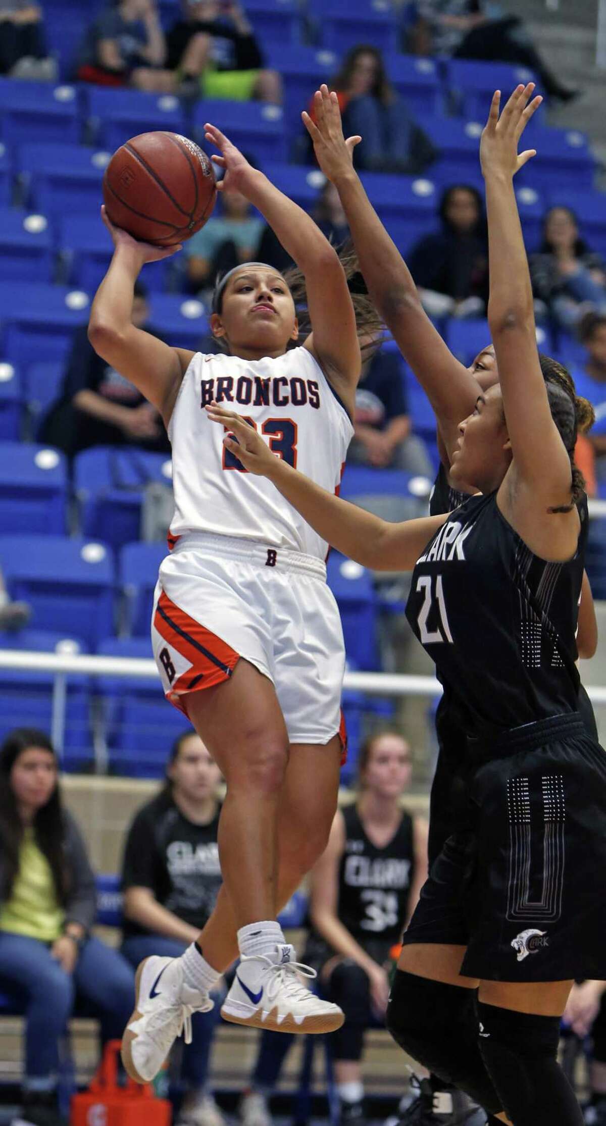 Brandeis Arriana Villa shoots over Clark Kayla Harris in girls basketball game on Saturday, January 12, 2019 at Northside Gym.
