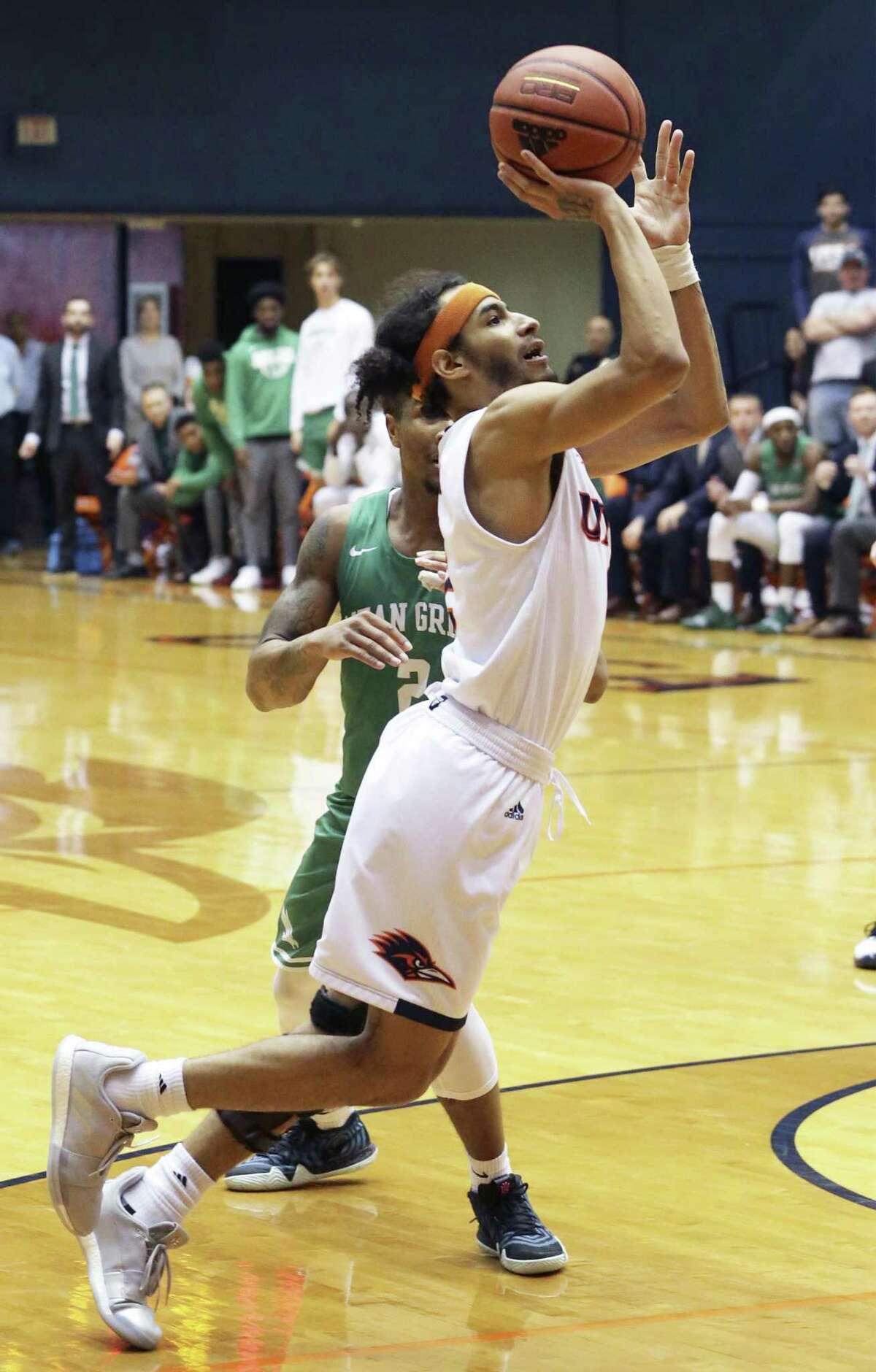 Jhivvan Jackson turns away from Jorden Duffy and hits the game winning shot as UTSA beats North Texas 76-74 at the Convocation Center on January 12, 2019.