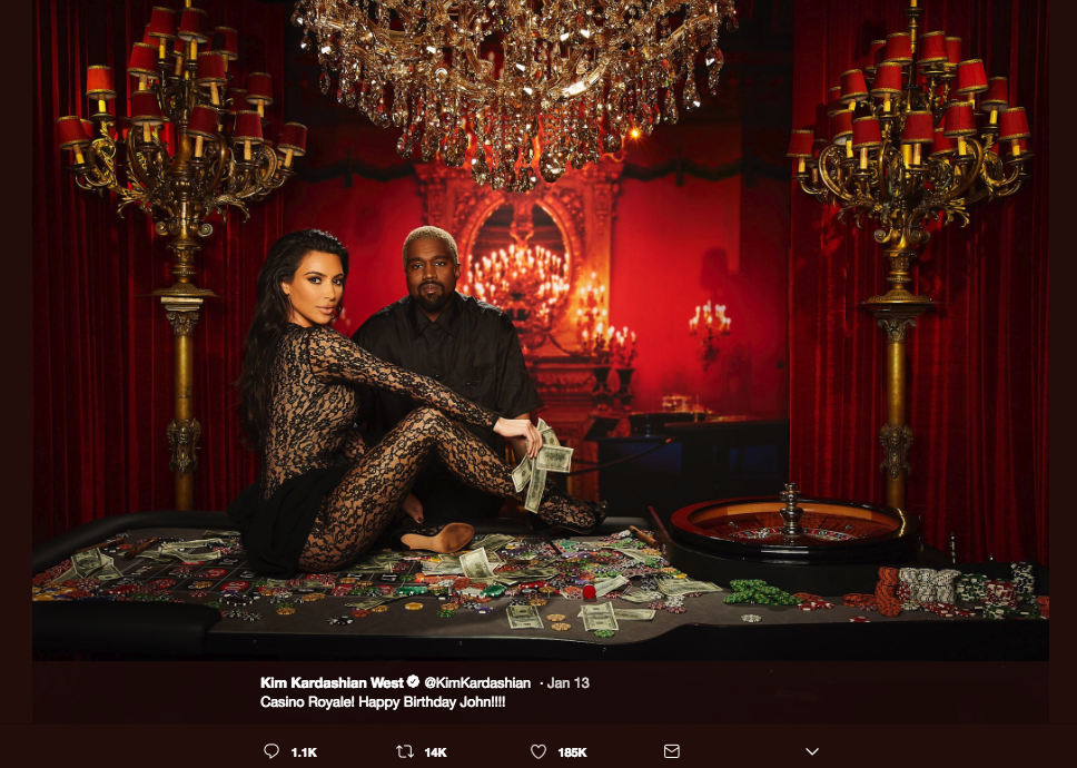 Kim Kardashian Baffles Fans With Louis Vuitton Snake Photo
