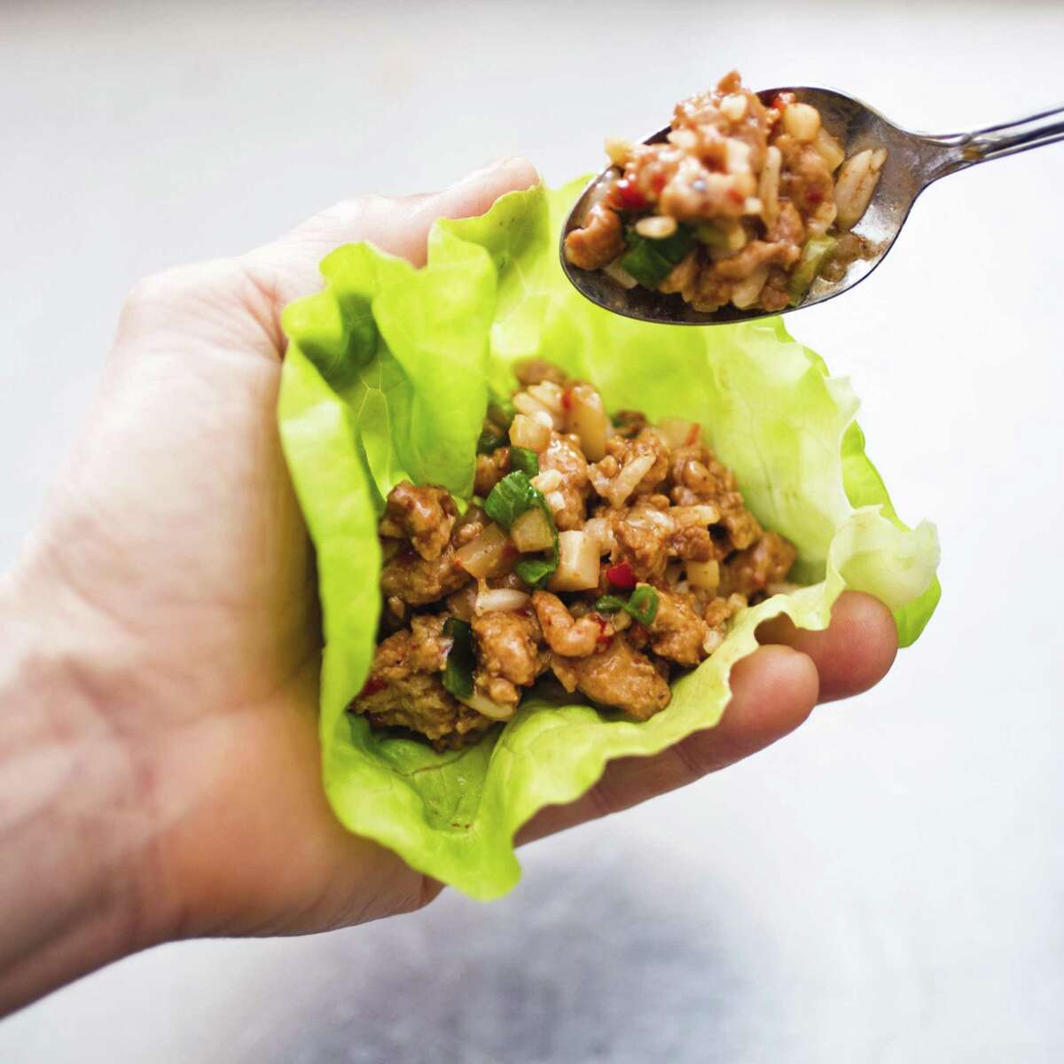Asian Chicken Lettuce Wraps have a light but flavor-packed filling.