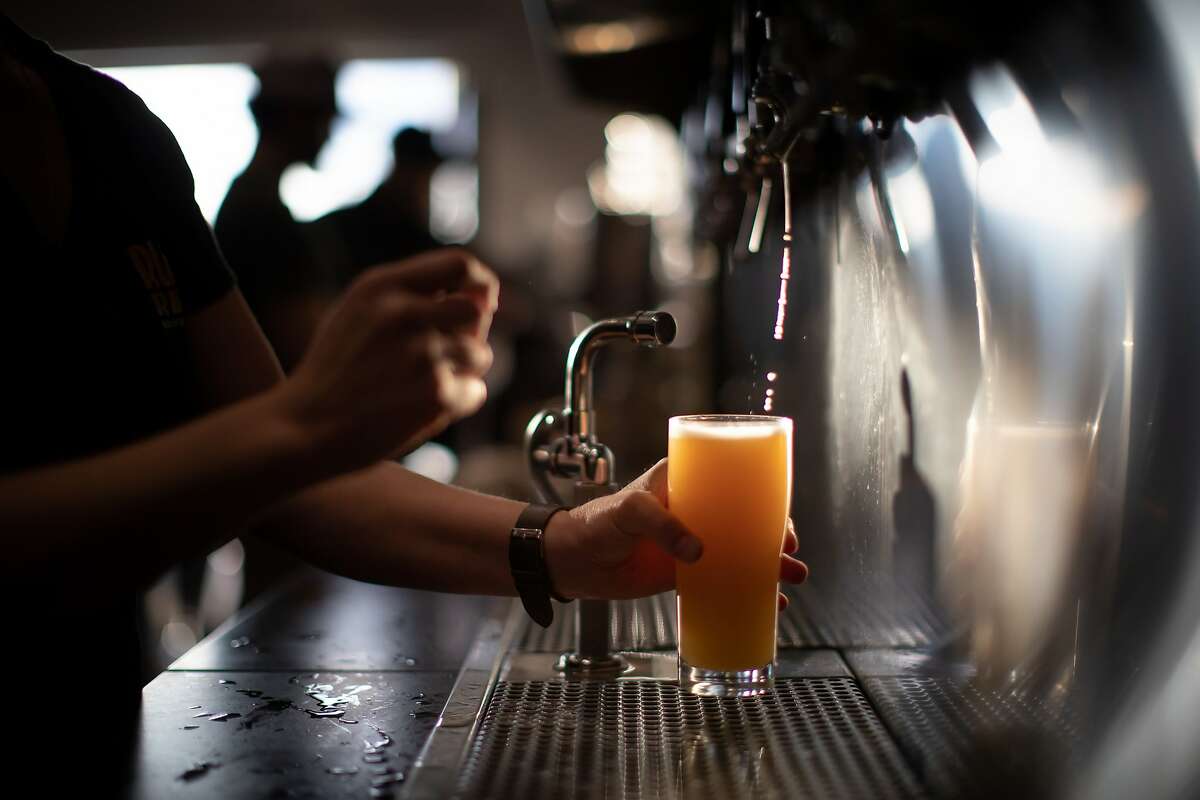 Beer is dispensed at the Russian River Brewing Company's patio on Saturday, Jan. 12, 2019, in Healdsburg, Calif.