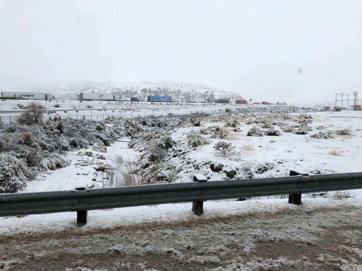 Update Grapevine reopens after storm spurs traffic nightmare