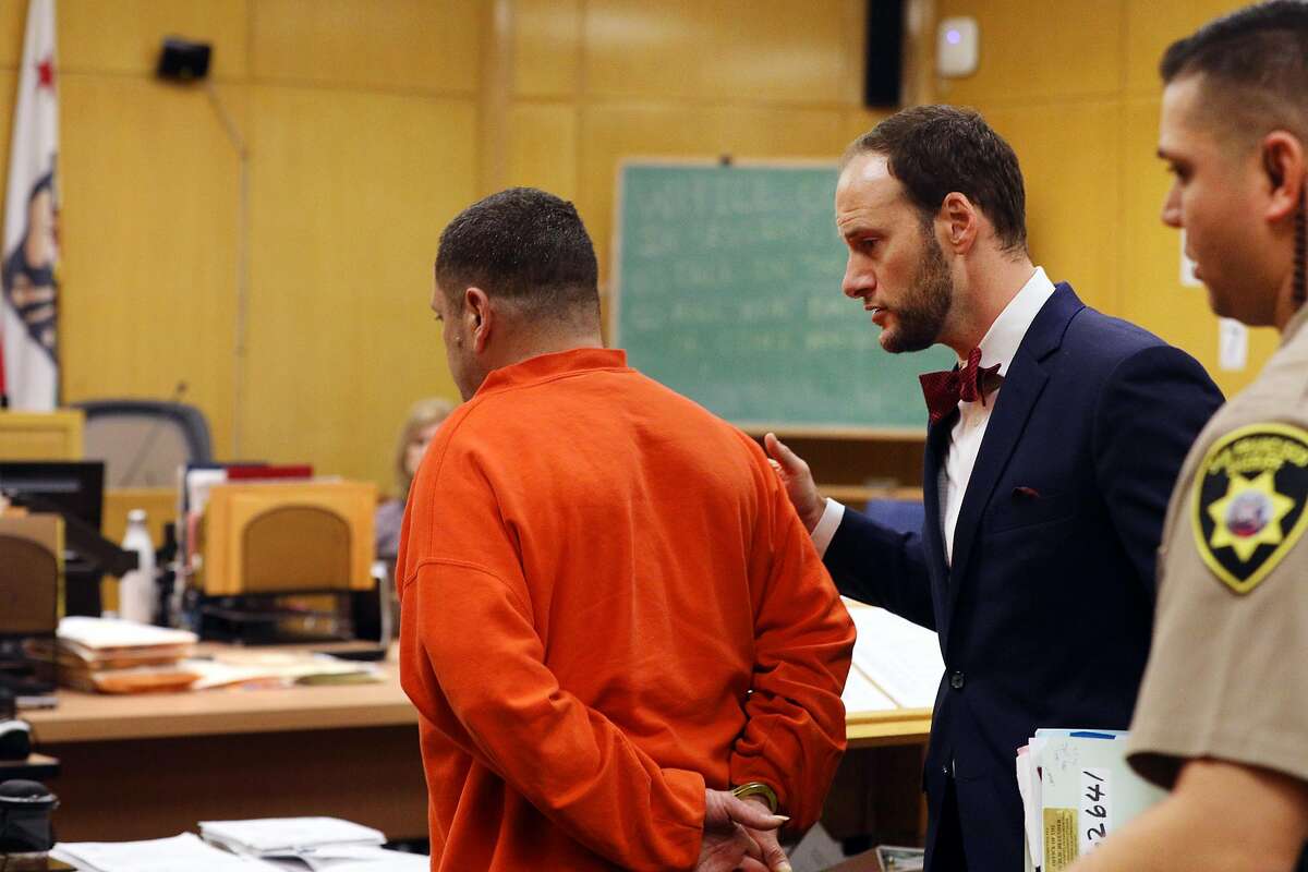 Deputy Public Defender Chesa Boudin (center) speaks to client at a pretrial conference in Judge Christopher Hite's courtroom in Department 23 at the Hall of Justice on Monday, January 14, 2019 in San Francisco, Calif.