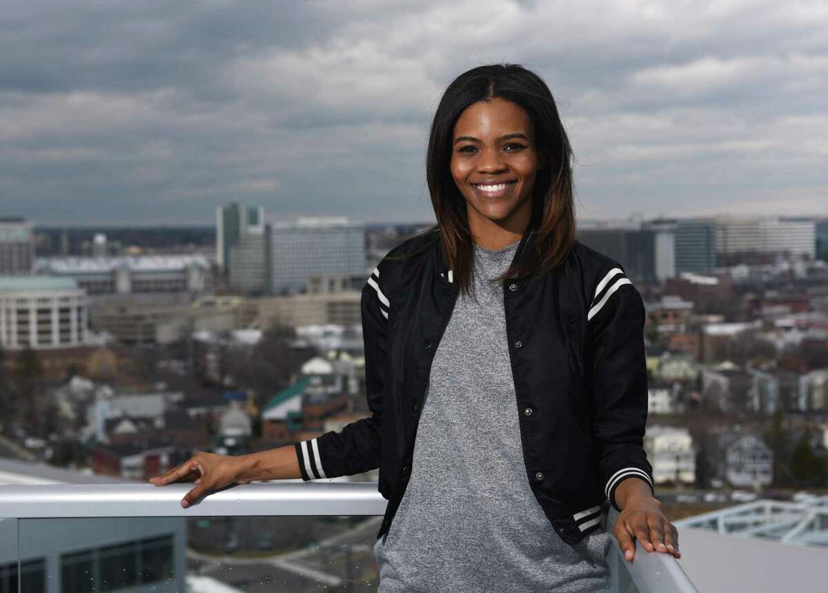 Degree180 CEO Candace Owens poses overlooking the city from her home office in Stamford, Conn. Monday, Feb. 29, 2016. Owens was bullied with racist threats as a student in high school and is now launching an anti-bullying website, Social Autopsy, which launches its beta version on Friday, March 4.