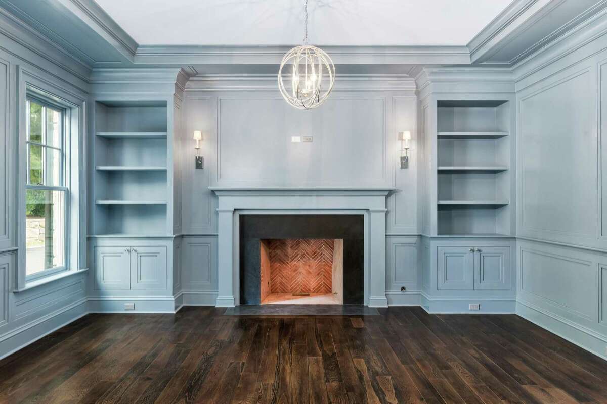 Newly constructed in 2017, 37 Doubling Road was developed by Greenwich Custom Home Builders, LLC, and designed by James Schettino Architects. The six-bedroom colonial has mostly a neutral décor, including the white-on-white kitchen, creating a blank slate for the buyer; however, the library has been saturated in a muted shade of blue thats tasteful, inviting and memorable.