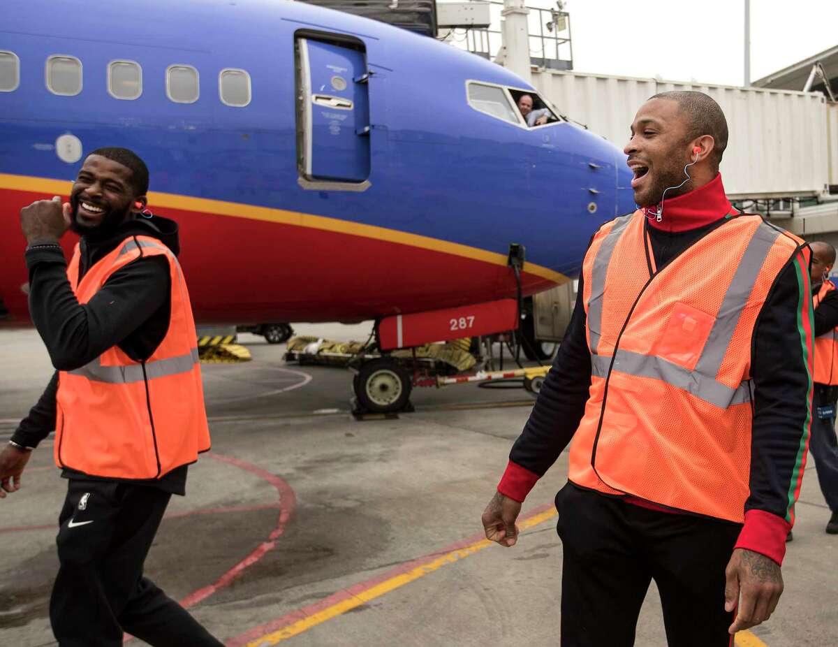 PHOTOS: Check out Rockets players working at Hobby Airport on Tuesday Houston Rockets players James Ennis III, left, and PJ Tucker walk into the ramp area at William P. Hobby Airport on Tuesday, Jan. 15, 2019, in Houston. The Rockets players teamed up with Southwest Airlines to surprise travelers at Hobby Airport. Southwest employees joined the players, Clutch the Bear, and members of the Rockets Power Dancers in greeting and interacting with customers at the airport while helping to perform duties such as announcing flight information and collecting boarding passes. Browse through the photos above to see the Rockets players in action at Hobby Aiport ...