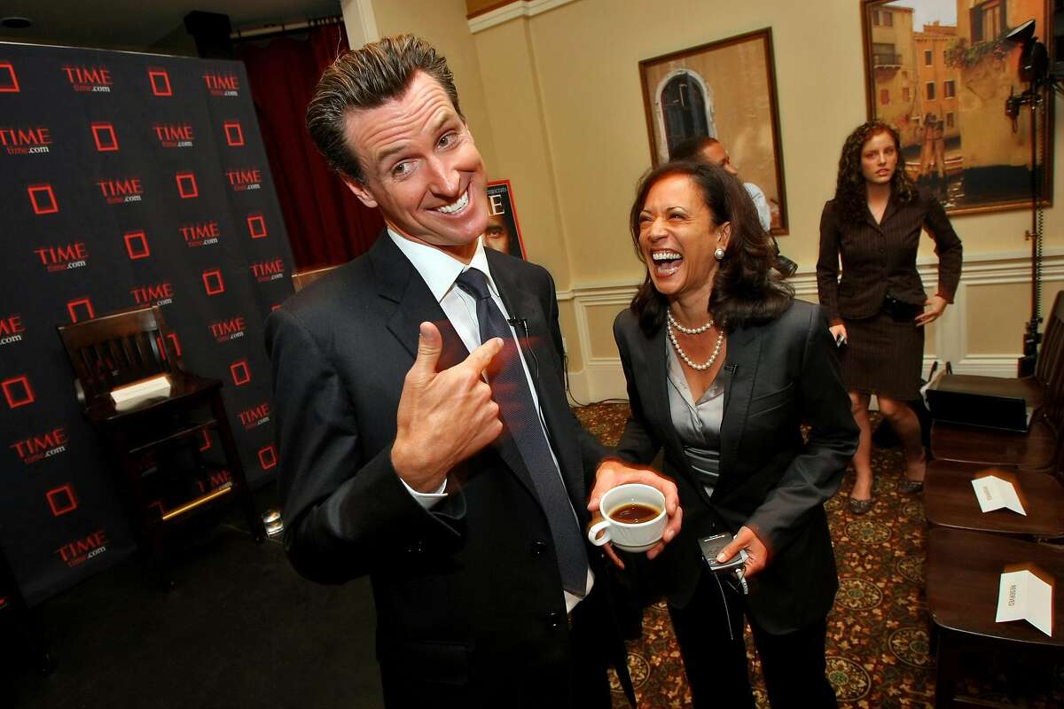 Gavin Newsom and Kamala Harris laugh at a Time magazine breakfast for up and coming politicians as part of the Democratic National Convention, Aug. 26, 2008, in Denver, Colorado.